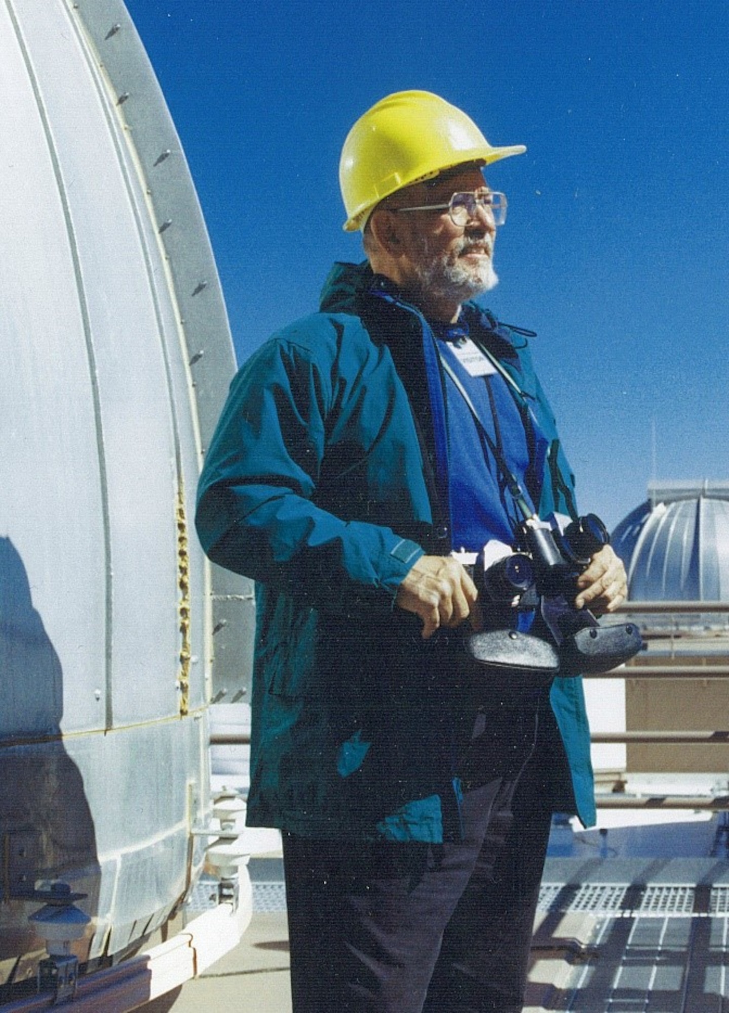 man standing outside of a building