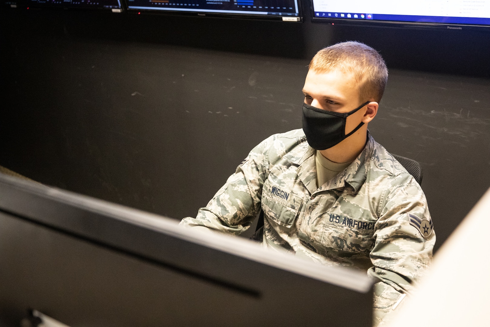 In support of COVID-19 relief operations for the state’s department of information technology, Airman 1st Class Noah Wiggin, an IT specialist with 157th Air Refueling Wing Communication Flight, configures dashboards in Concord on May 26, 2020.