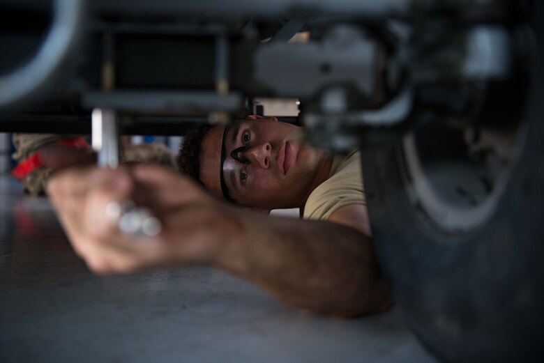 Senior Airman Nicholas Summit, 22nd Maintenance Squadron aerospace ground equipment journeyman, inspects a bolt on a self-generating nitrogen cart July 8, 2020, at McConnell Air Force Base, Kansas. AGE Airmen are responsible for maintaining flightline equipment for the 41 aircraft assigned to McConnell. (U.S. Air Force photo by Senior Airman Alexi Bosarge)