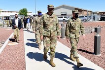 Gen. John E. Hyten, Vice Chairman of the Joint Chiefs of Staff, and Gen. Stephen W. Wilson, Vice Chief of Staff of the Air Force, approach the 30th Reconnaissance Squadron during a visit at Creech Air Force Base, Nevada