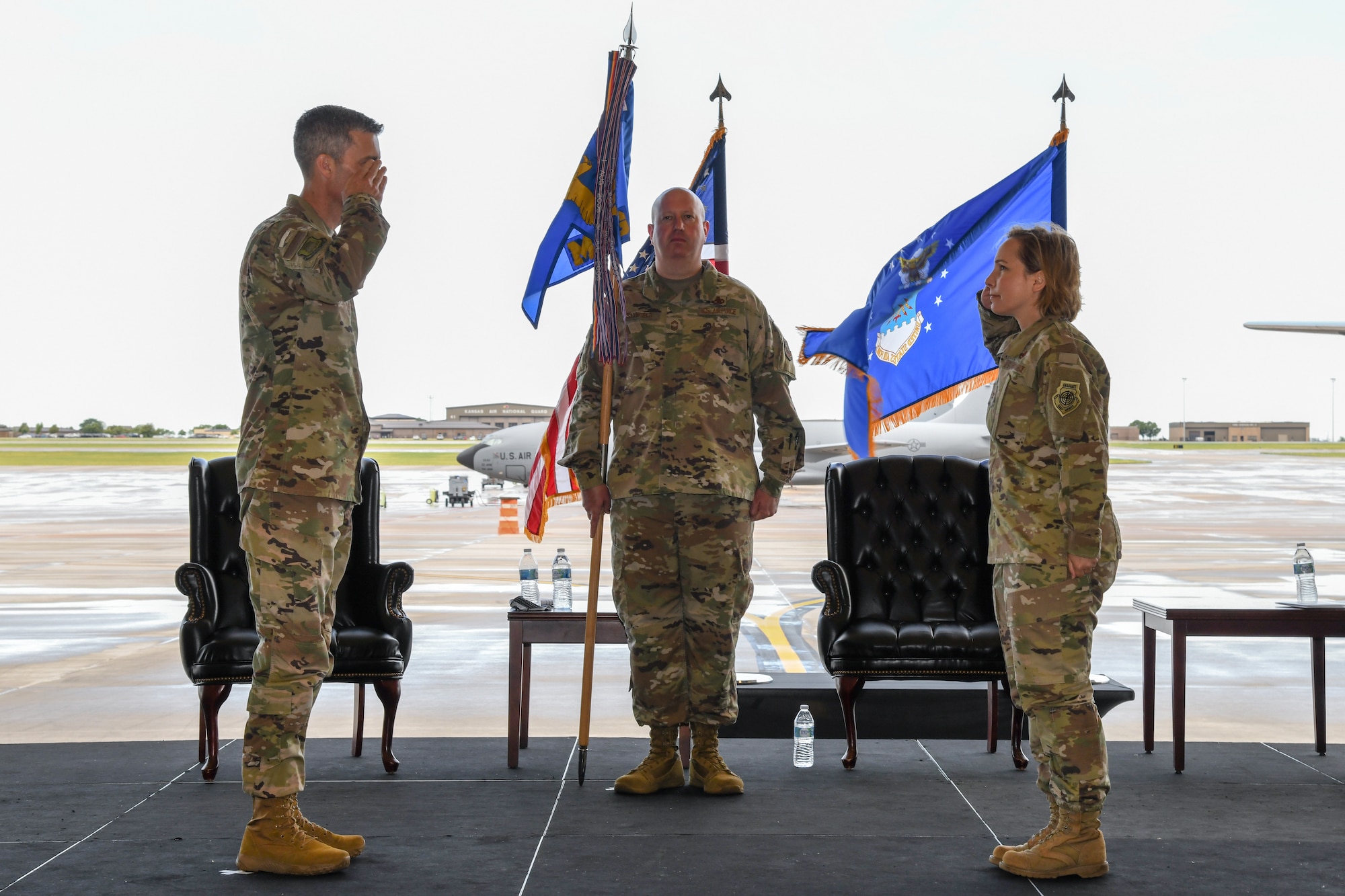 Col. Emily Farkas, incoming 22nd Maintenance Group commander, right, assumes command during a change of command ceremony July 9, 2020, at McConnell Air Force Base, Kansas.