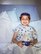Airman 1st Class Isaiah A. Nieves, 2nd Maintenance Squadron aerospace ground equipment journeyman, plays video games in a hospital bed as a child. Nieves was diagnosed with Acute Lymphoblastic Leukemia at the age of four. (Courtesy photo)