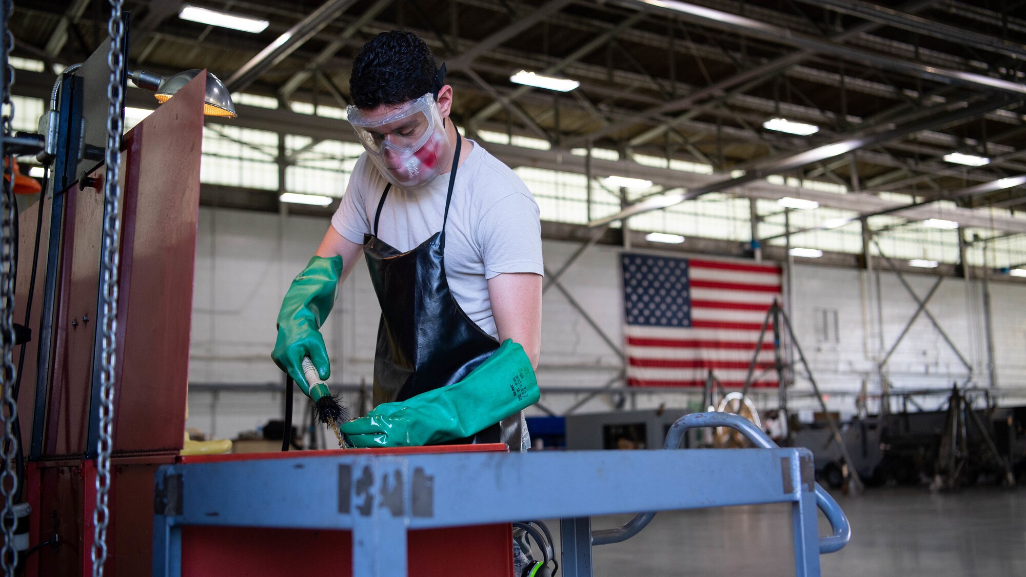 Airman 1st Class Isaiah E. Nieves, 2nd Maintenance Squadron aerospace ground equipment journeyman, cleans mechanical parts at Barksdale Air Force Base, La., June 10, 2020. Nieves joined the Air Force in July 2019, and arrived at Barksdale in March 2020. (U.S. Air Force photo by Airman 1st Class Jacob B. Wrightsman)