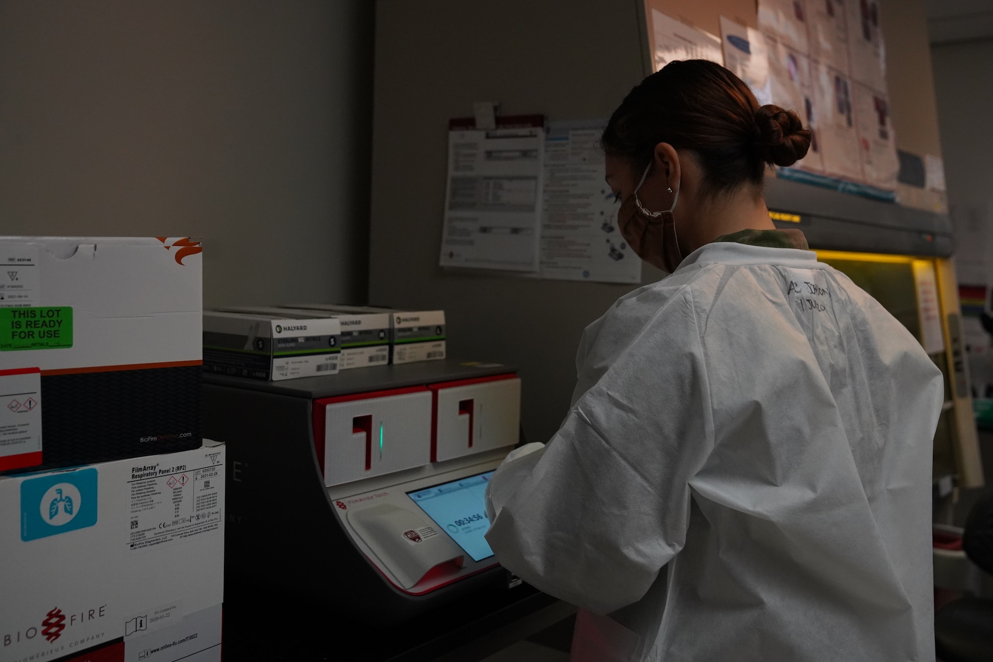 U.S. Air Force Airman 1st Class Alexandria Johnson, 81st Diagnostic and Therapeutics Squadron lab technician, conducts a test of a COVID-19 specimen inside the Keesler Medical Center at Keesler Air Force Base, Mississippi, July 1, 2020. The Microbiology Department has been working to get fast, efficient, and accurate COVID test results to their patients. (U.S. Air Force photo by Airman 1st Class Spencer Tobler)