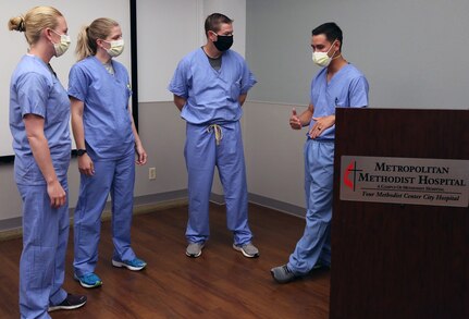 Soldiers from the Urban Augmentation Medical Task Force-627 begin supporting Methodist Hospital medical staff in San Antonio July 9.