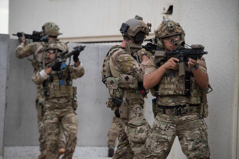 A photo of an Airman performing small unit movement tactics