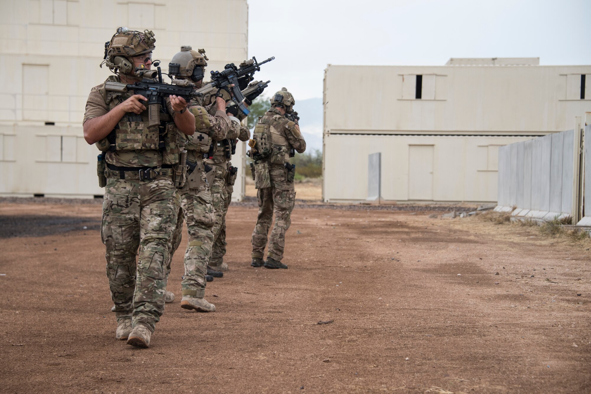 A photo of an Airman performing small unit movement tactics