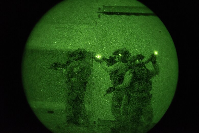 A photo of an Airman performing small unit movement tactics