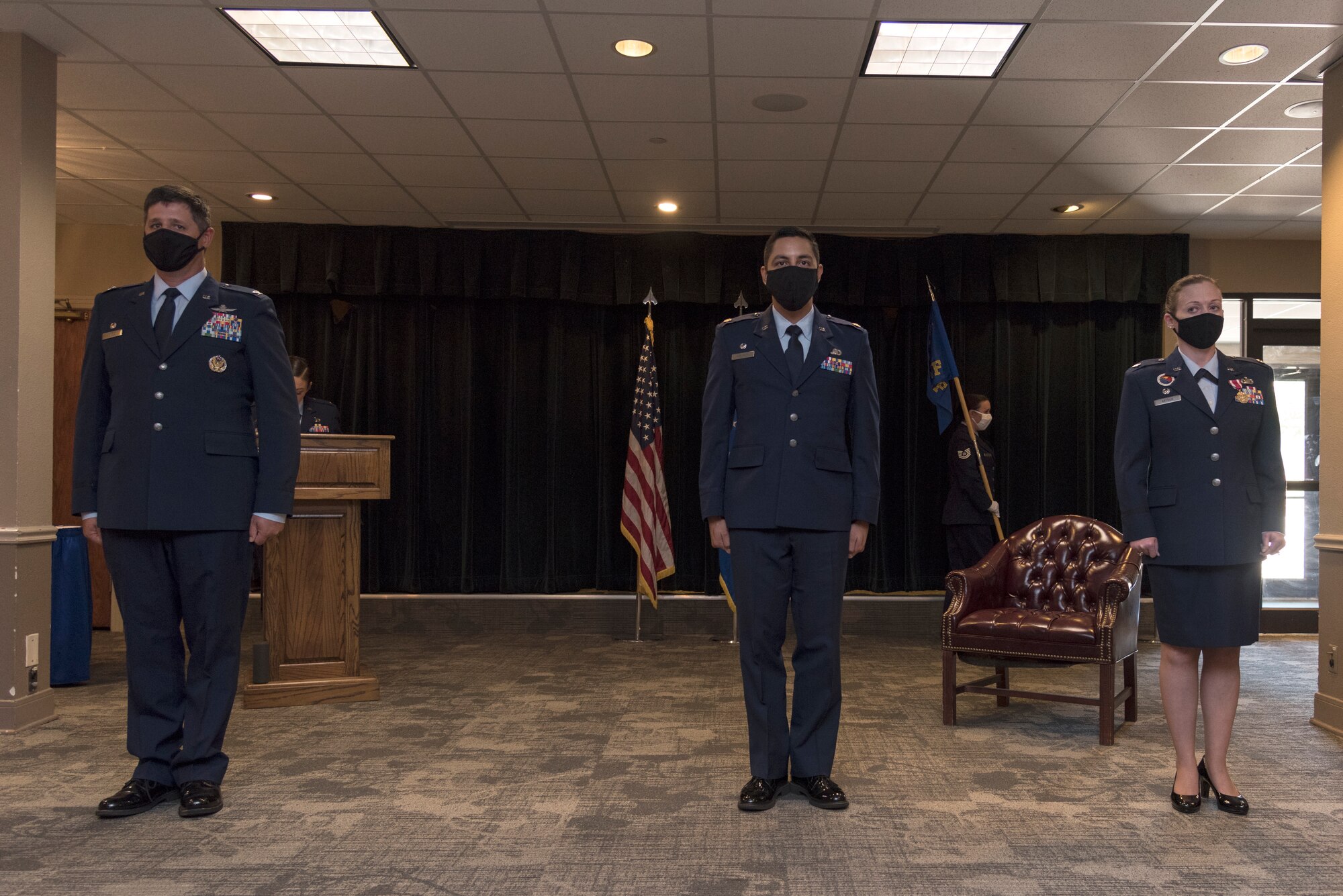 Maj. Aaron Velasco, takes command of the 47th Contracting Flight from Lt. Col. Emily Arthur, prior Contracting Flight commander, at Laughlin Air Force Base, Texas, July 10, 2020. The 47th Contracting Flight is responsible for the purchase of supplies, services and construction from contractors and develops, negotiates and administers contracts awarded with appropriated funds. (U.S. Air Force photo by Senior Airman Anne McCready)