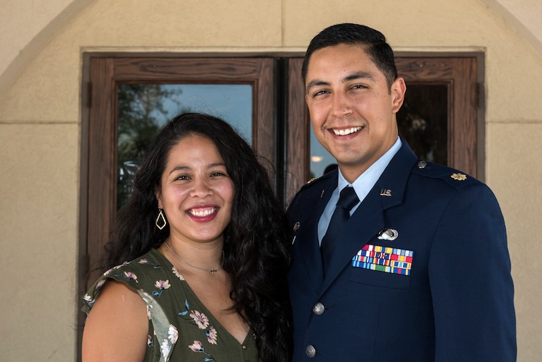 Maj. Aaron Velasco, 47th Contracting Flight commander, and his wife, Jackie, pose for a photo after the change of command July 10, 2020, at Laughlin Air Force Base, Texas. The Velasco family hails from San Antonio, where he was a flight commander in at Basic Military Training. (U.S. Air Force photo by Senior Airman Anne McCready)
