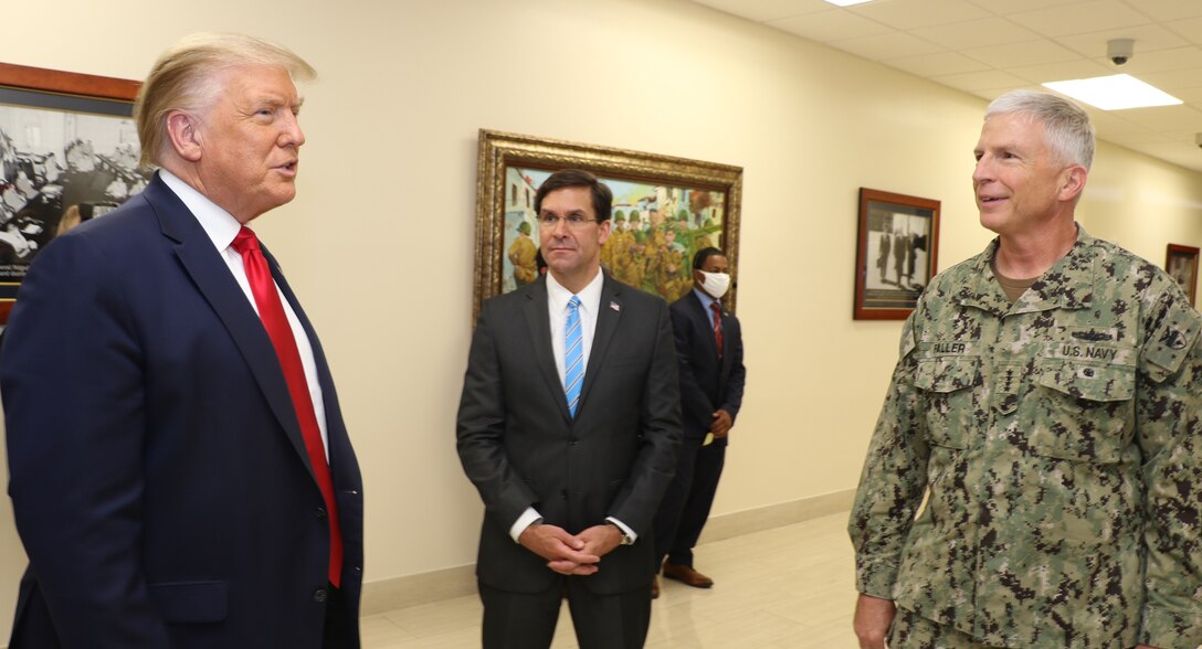 President Donald J. Trump talks with Defense Secretary Dr. Mark T. Esper and Navy Adm. Craig Faller, commander of U.S. Southern Command, at SOUTHCOM headquarters in Doral, Florida.