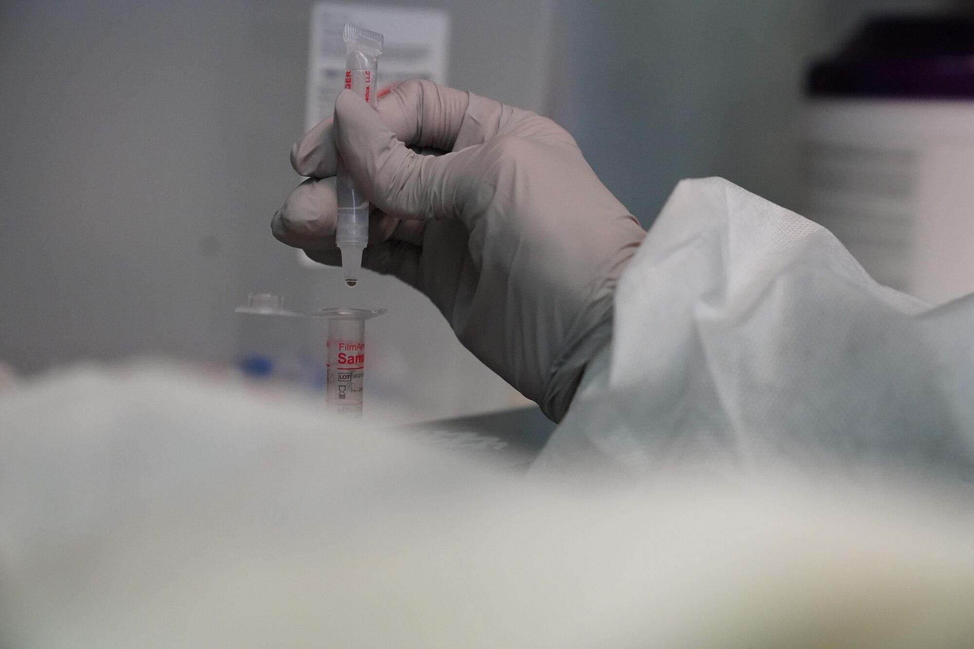 U.S. Air Force Airman 1st Class Alexandria Johnson, 81st Diagnostic and Therapeutics Squadron lab technician, prepares a COVID-19 sample for testing inside the Keesler Medical Center at Keesler Air Force Base, Mississippi, July 2, 2020. The Microbiology Department has been working to get fast, efficient, and accurate COVID test results to their
patients. (U.S. Air Force photo by Airman 1st Class Spencer Tobler)
