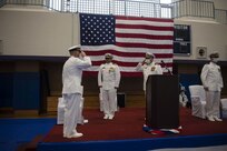 SASEBO, Japan (July 10, 2020) - Capt. Derek Brady, right, salutes Capt. Marvin Thompson, deputy commander of Expeditionary Strike Group 7, as he assumes command of Mine Countermeasure Squadron Seven from Capt. Adrian Ragland, July 10. COMCMRON 7 conducts integrated mine countermeasure operations using air, Surface, and explosive ordnance disposal assets in both exercise and regional conflict scenarios throughout the U.S. Seventh Fleet Area of Responsibility.