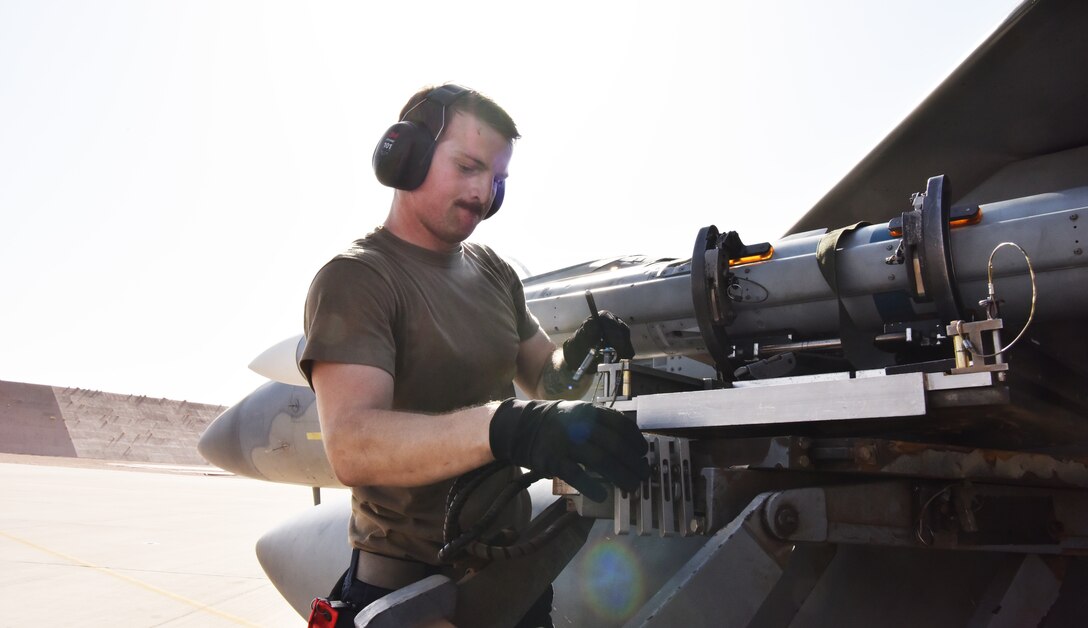 Airmen from the 378th Expeditionary Operations Group conduct an integrated combat turn to test their capability to land, refuel, weapons reload and take off.