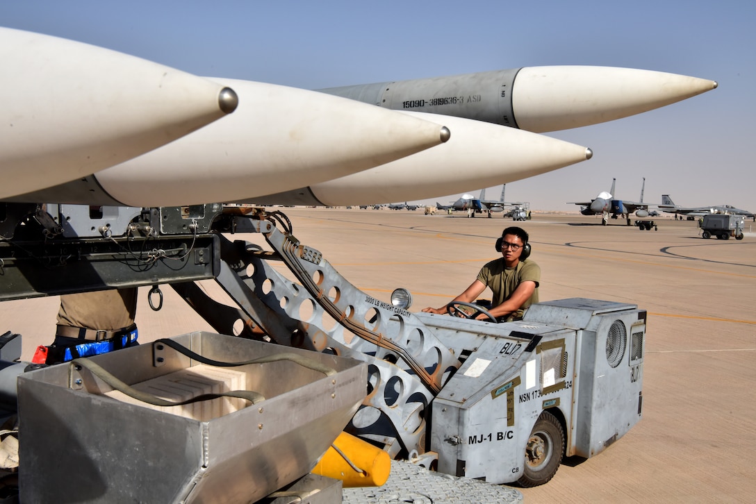 Airmen from the 378th Expeditionary Operations Group conduct an integrated combat turn to test their capability to land, refuel, weapons reload and take off.