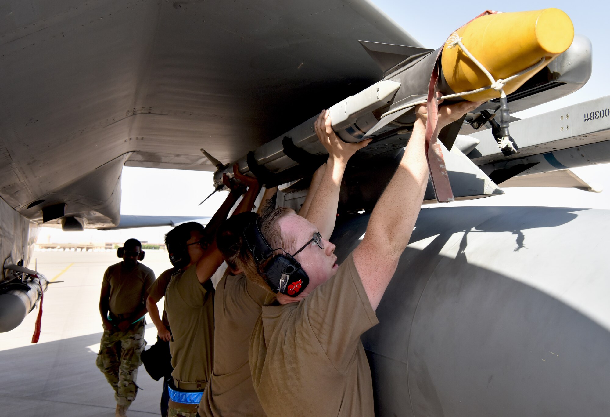 Airmen from the 378th Expeditionary Operations Group conduct an integrated combat turn to test their capability to land, refuel, weapons reload and take off.