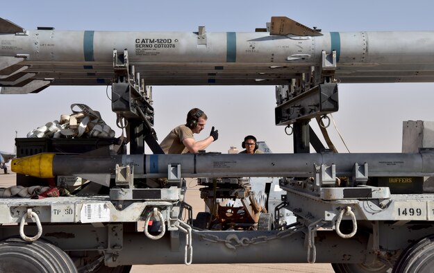 Airmen from the 378th Expeditionary Operations Group conduct an integrated combat turn to test their capability to land, refuel, weapons reload and take off.