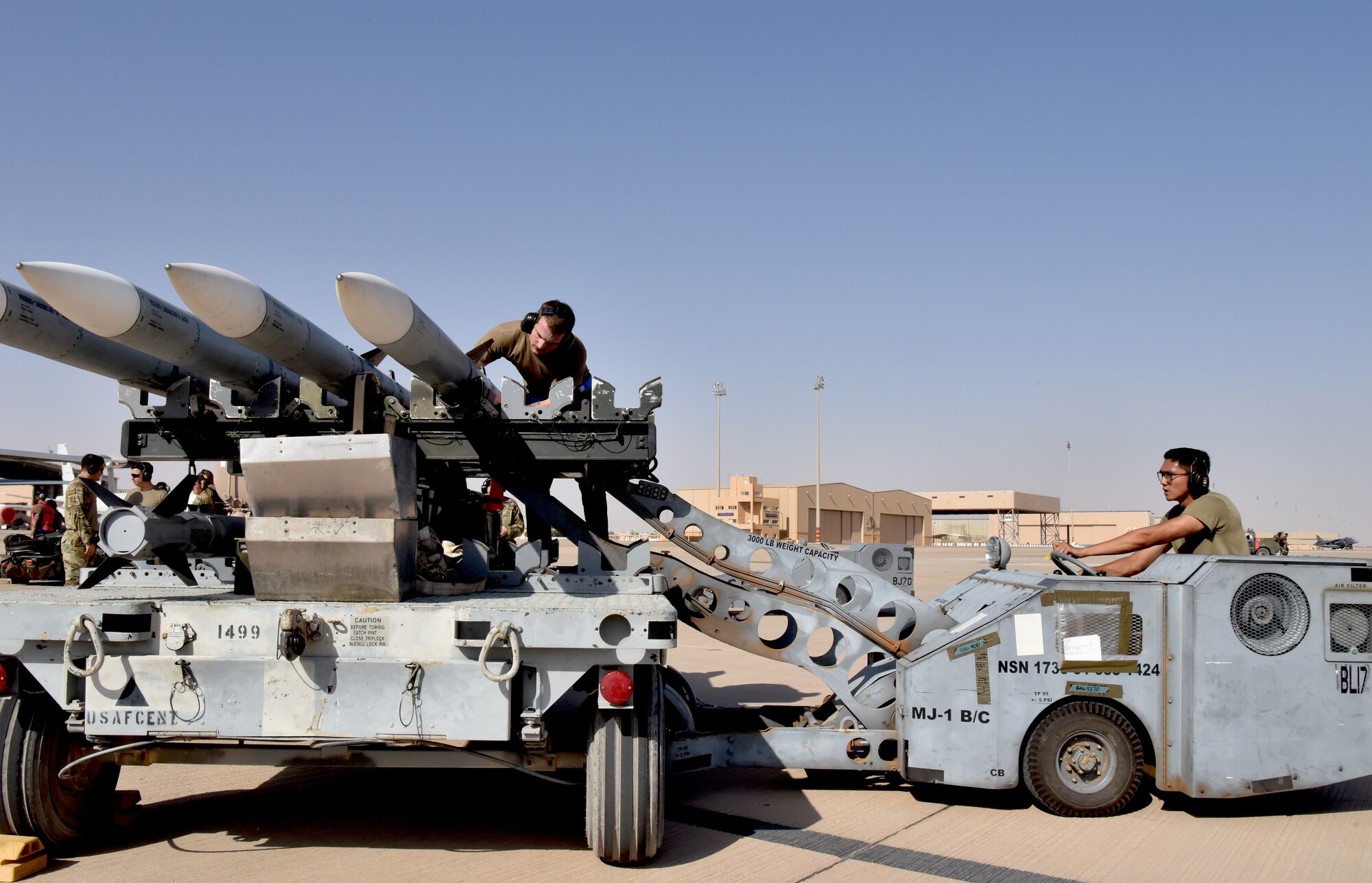 Airmen from the 378th Expeditionary Operations Group conduct an integrated combat turn to test their capability to land, refuel, weapons reload and take off.