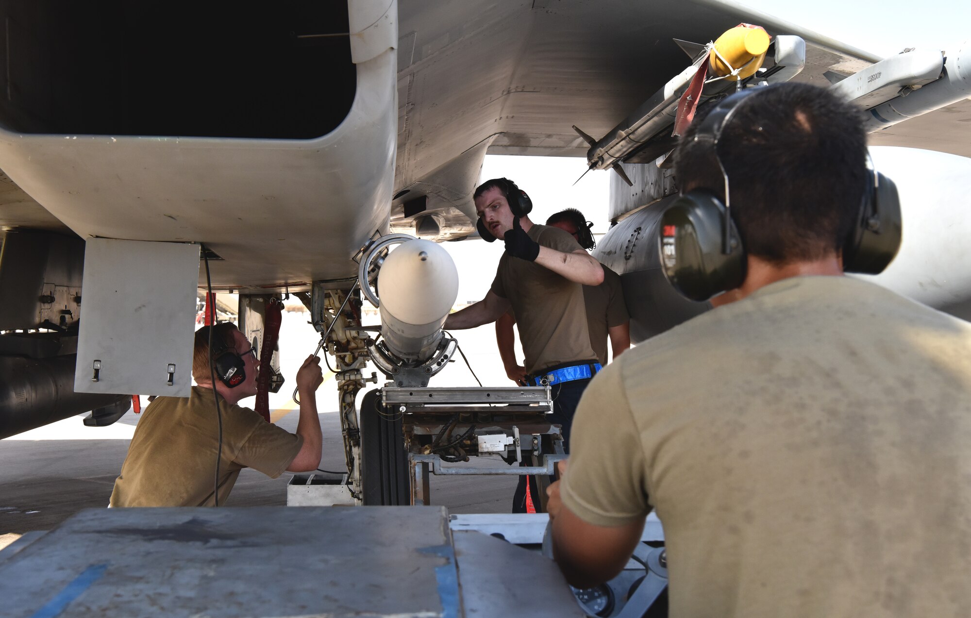 Airmen from the 378th Expeditionary Operations Group conduct an integrated combat turn to test their capability to land, refuel, weapons reload and take off.