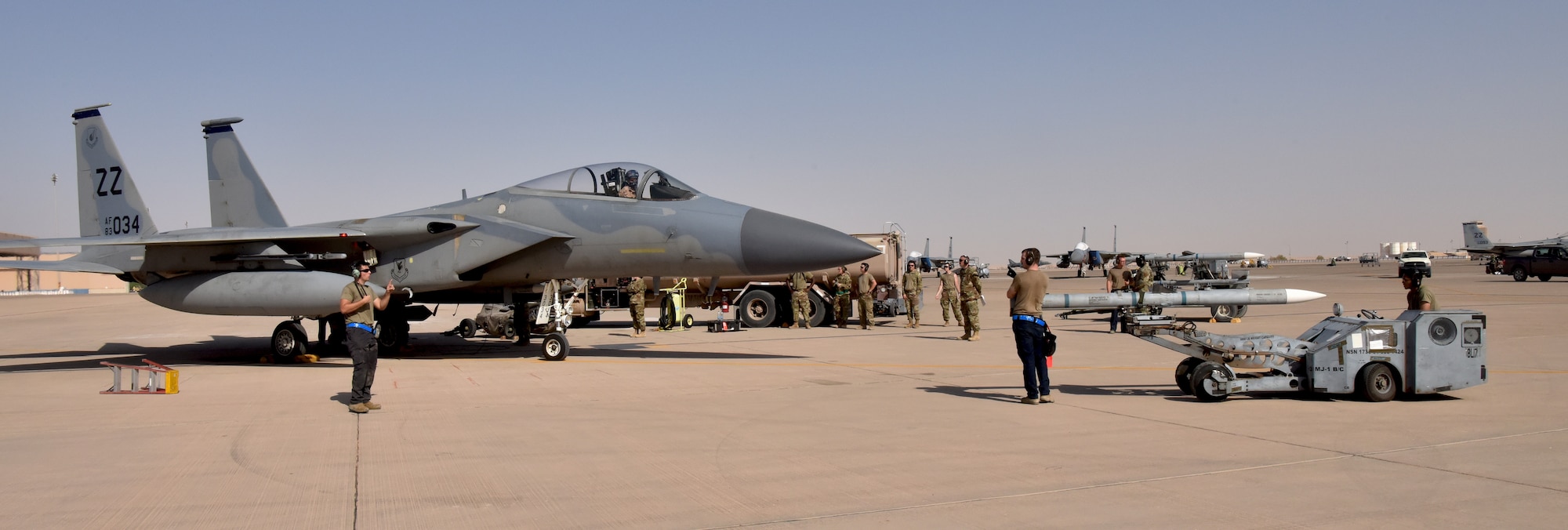 Airmen from the 378th Expeditionary Operations Group conduct an integrated combat turn to test their capability to land, refuel, weapons reload and take off.