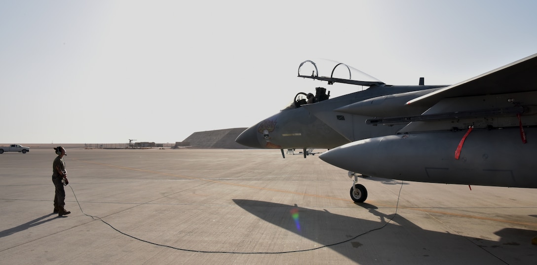 Airmen from the 378th Expeditionary Operations Group conduct an integrated combat turn to test their capability to land, refuel, weapons reload and take off.