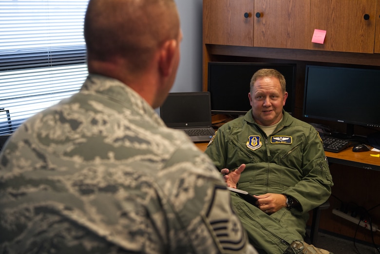 Col. Bill Bray, 434th Aerospace Medicine Squadron flight surgeon, provides medical counseling to a Grissom Airman at the Grissom clinic, July 12, 2020. Bray recently returned to Grissom as a full-time medical provider to assist the base in meeting its readiness requirements. (U.S. Air Force photo / A1C Harrison Withrow)