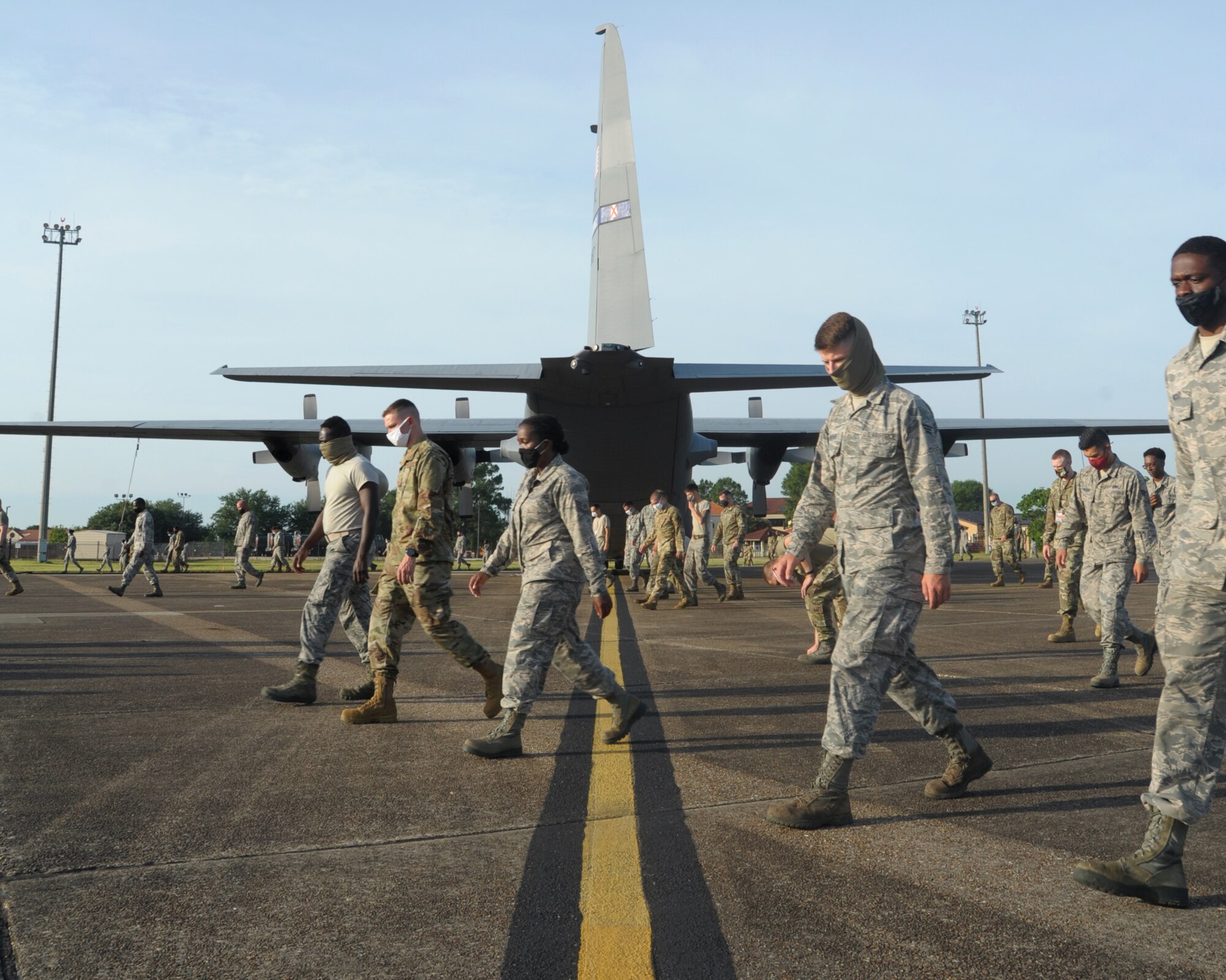 commander touches the nose of an aircraft