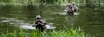 U.S. Soldiers with the 6th Cavalry Regiment cross a river to reach an objective during exercise Allied Spirit at Drawsko Pomorskie Training Area in Poland, June 10, 2020. (U.S. Army photo by Sgt. Meagan Mooney)