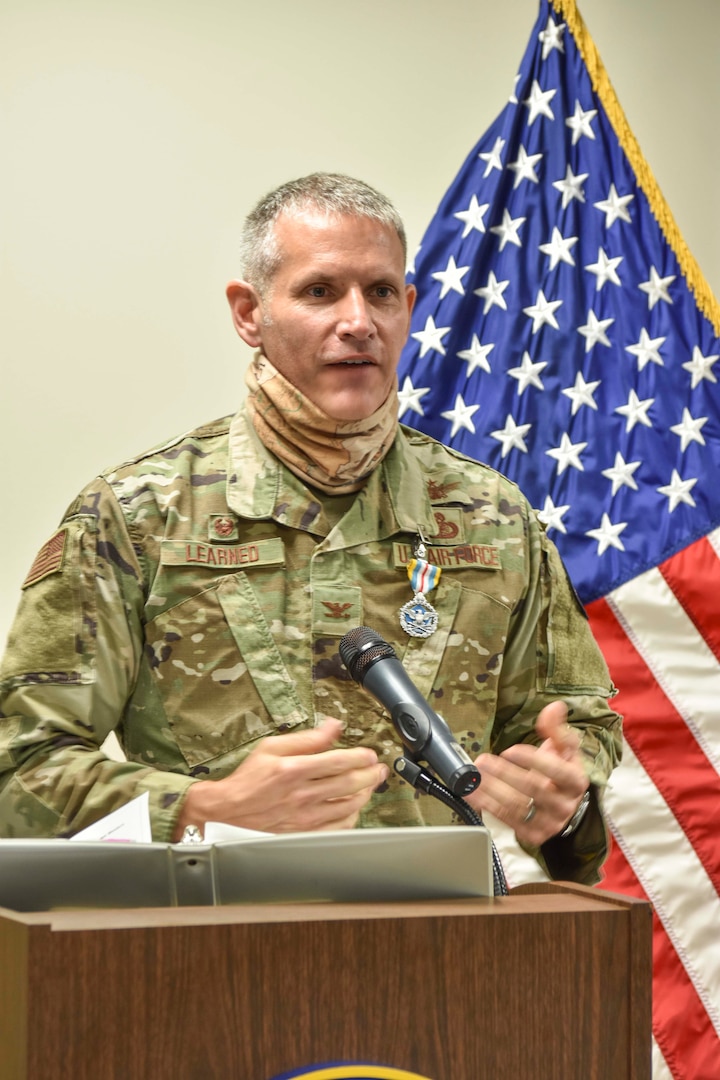 A man speaking at a podium