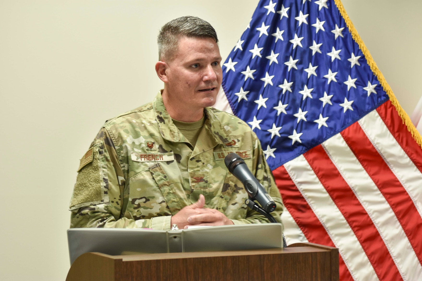 A man speaking at a podium