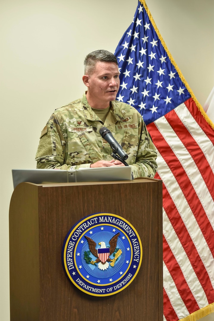 A man speaking at a podium