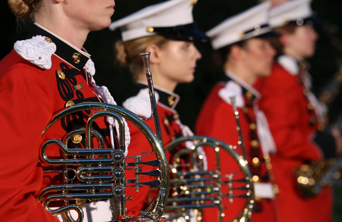 Marines with “The President’s Own” U.S. Marine Band perform during a Friday Evening Parade at Marine Barracks Washington, D.C., July 7, 2020. Admiral Michael M. Gilday, chief of naval operations, was the guest of honor, and the hosting official was the 38th Commandant of the Marine Corps, Gen. David H. Berger. (U.S. Marine Corps photo by Cpl. James Bourgeois)
