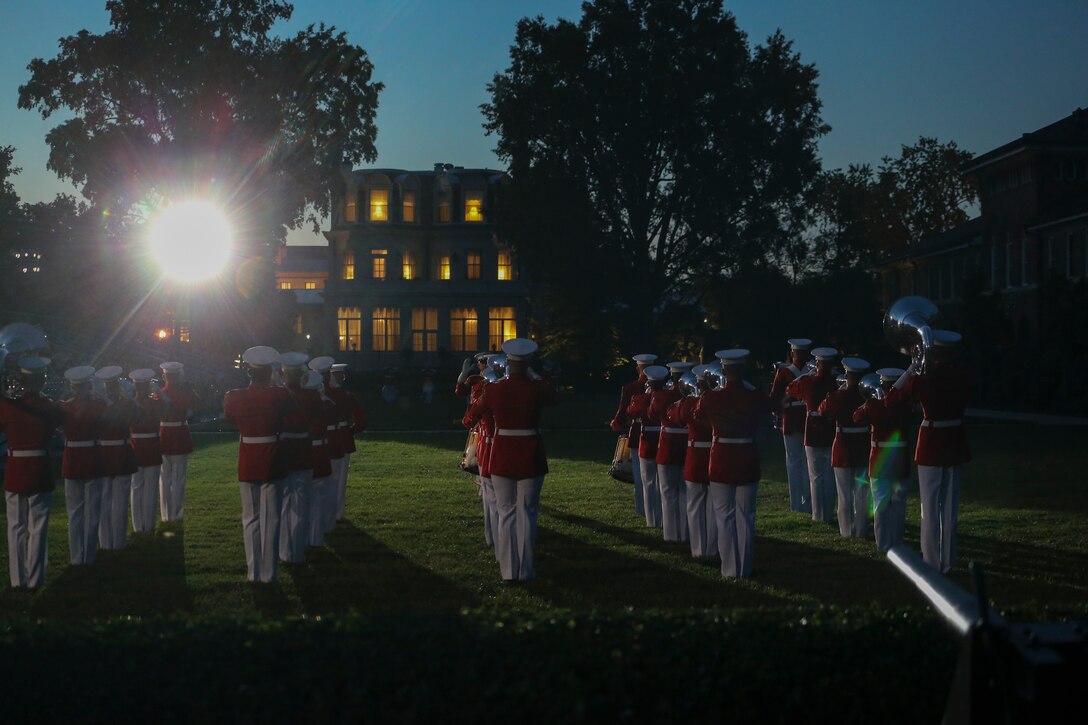 Marines with “The Commandant’s Own” U.S. Marine Drum and Bugle Corps perform during a Friday Evening Parade at Marine Barracks Washington, D.C., July 7, 2020. Admiral Michael M. Gilday, chief of naval operations, was the guest of honor, and the hosting official was the 38th Commandant of the Marine Corps, Gen. David H. Berger. (U.S. Marine Corps photo by Cpl. James Bourgeois)