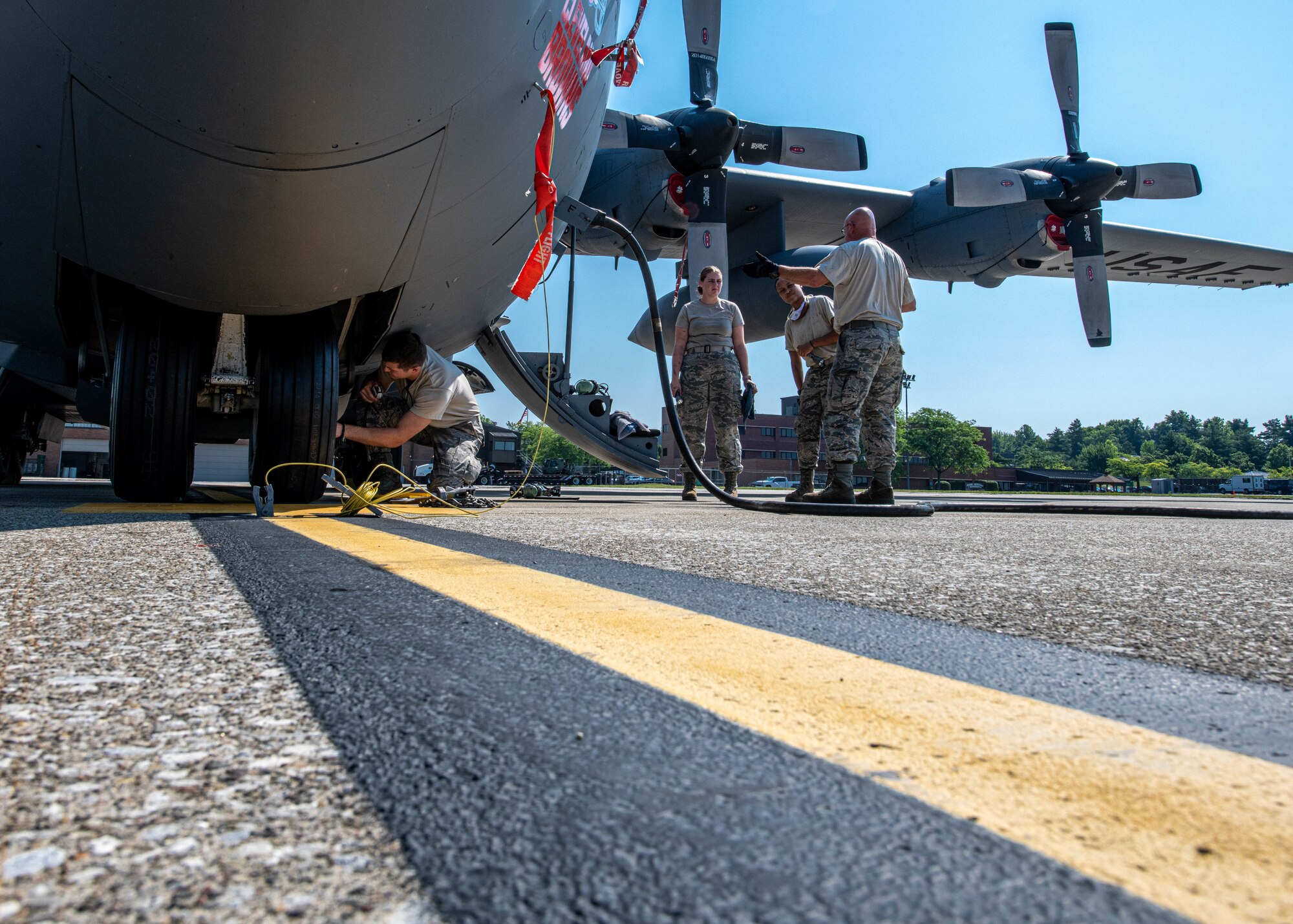Crew chiefs assigned to the 910th Maintenance Squadron conduct pre-flight maintenance checks on Youngstown Air Reserve Station’s flightline, July 7, 2020. The Airmen conduct pre-flight maintenance checks to ensure C-130H Hercules aircraft assigned to the 757th Airlift Squadron are ready for aircrew members to fly.