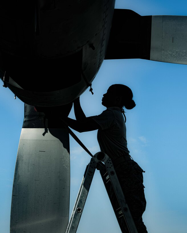 Senior Airman Dayna Jones, a crew chief with the 910th Maintenance Squadron, performs a thru-flight inspection on a C-130H Hercules, on Youngstown Air Reserve Station’s flightline, July 7, 2020. Crew chiefs use thru-flight inspections to search for any loose, broken or corroded parts and foreign material prior to takeoff.