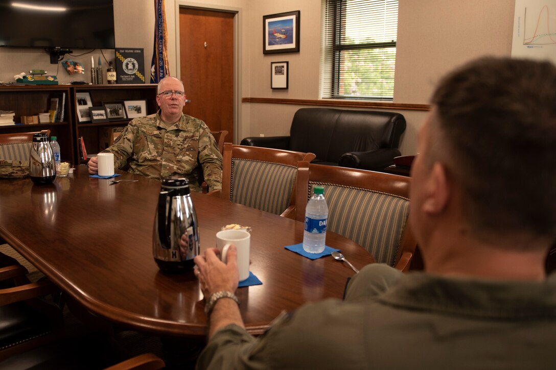 A photo of leadership talking.