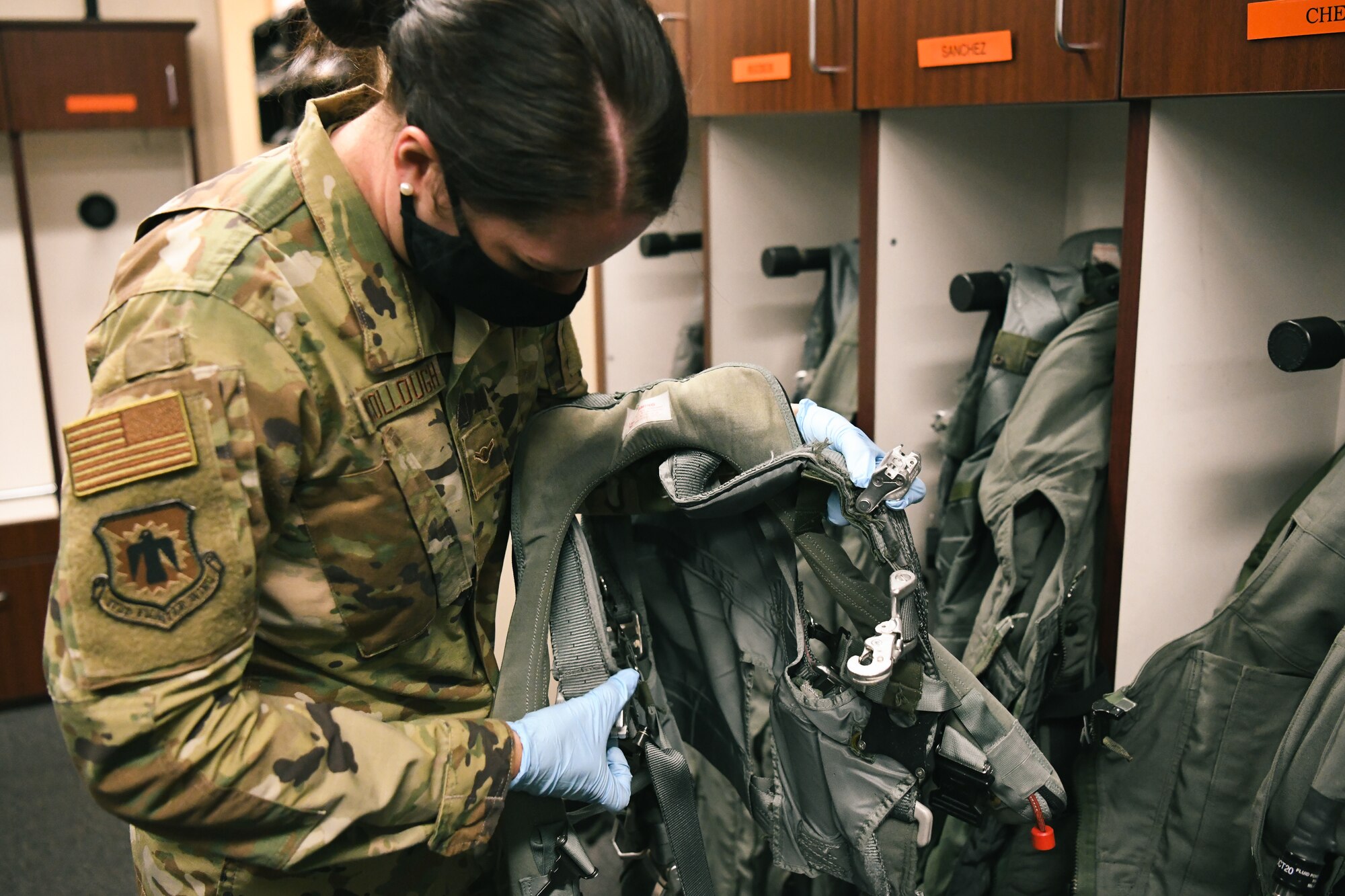 Airman inspects AFE equipment