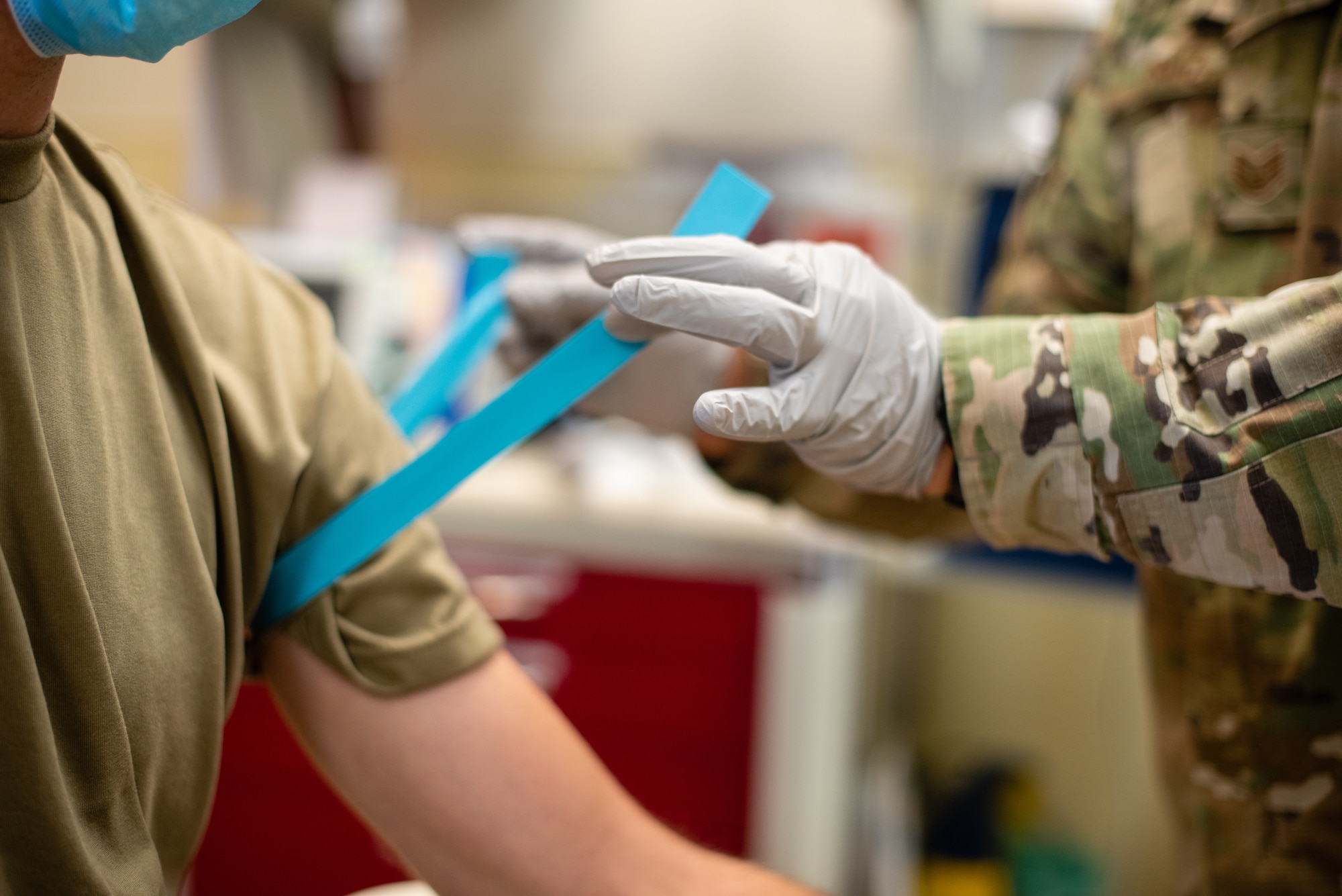 Airmen demonstrate a serology test at Creech Air Force Base.