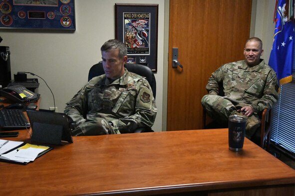 Col. Sean Carpenter, 926th Wing commander, and Chief Master Sgt. Jeffrey Scott, 926th Wing command chief, hosted the wing's first town hall meeting discussing racial disparity on July 11, 2020, Nellis Air Force Base, Nevada.  Due to COVID-19 restrictions, the meeting was held virtually through Zoom and included an anonymous question and answer portion utilizing a tab on the Air Force Connect app. (U.S. Air Force photo by Staff Sgt. Paige Yenke)