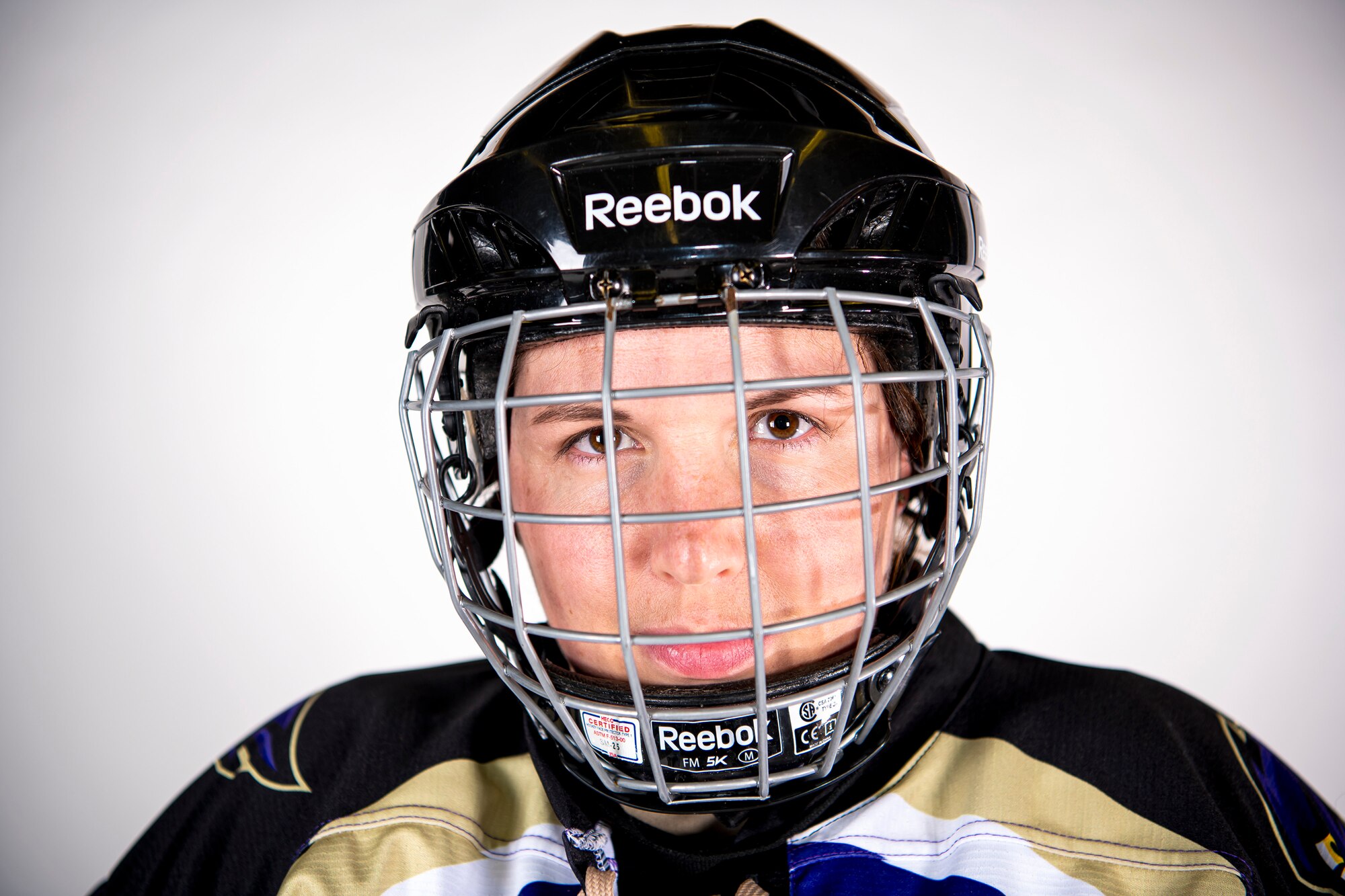 U.S. Air Force Maj. Eileen Ebenger, 501st Combat Support Wing medical operations flight commander, poses for a photo wearing her ice hockey kit at RAF Croughton, England, July 7, 2020. Ebenger is an avid hockey fan and currently plays for the Milton Keynes Falcons women’s ice hockey team. (U.S. Air Force photo by Senior Airman Eugene Oliver)