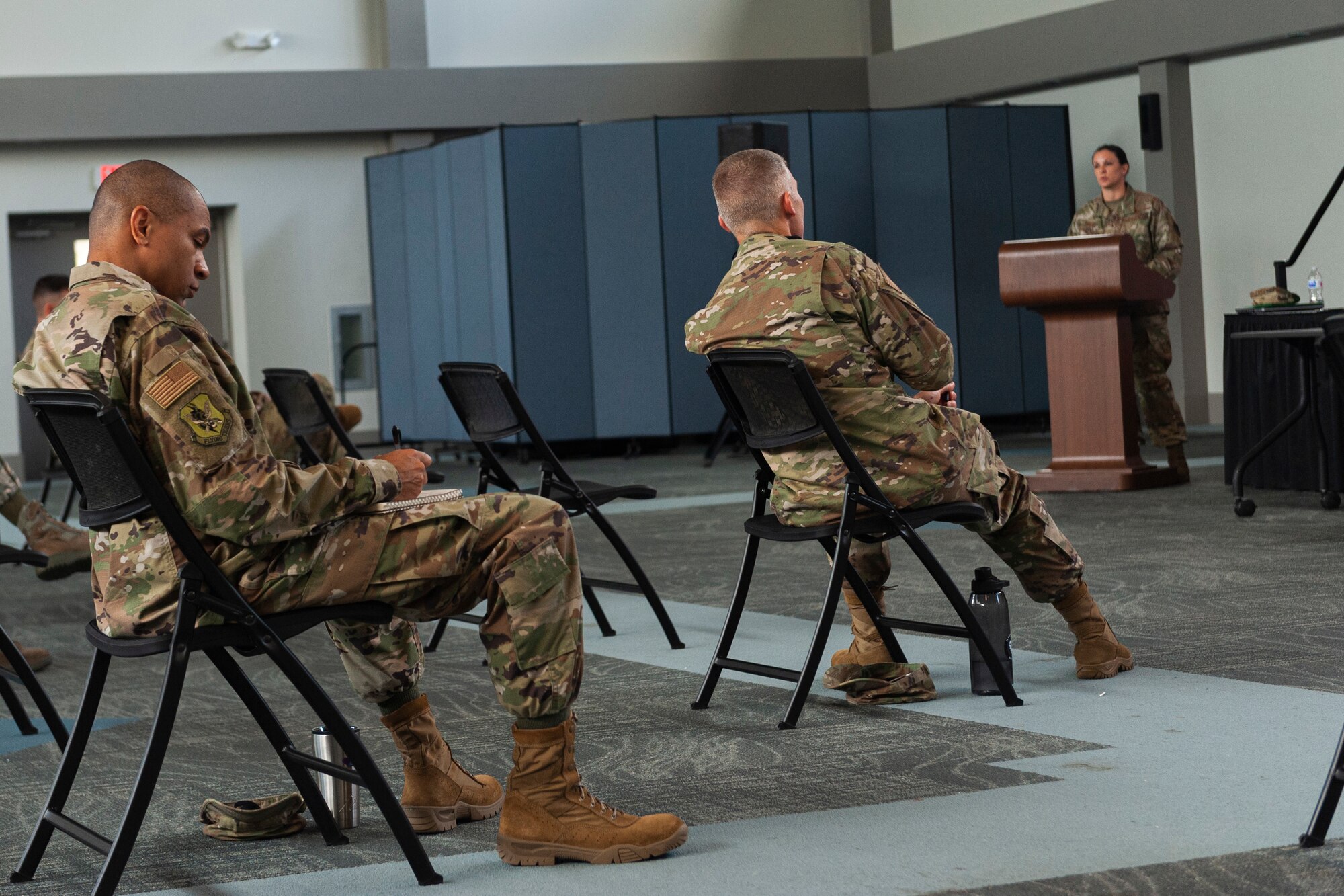 Photo of Airman taking notes