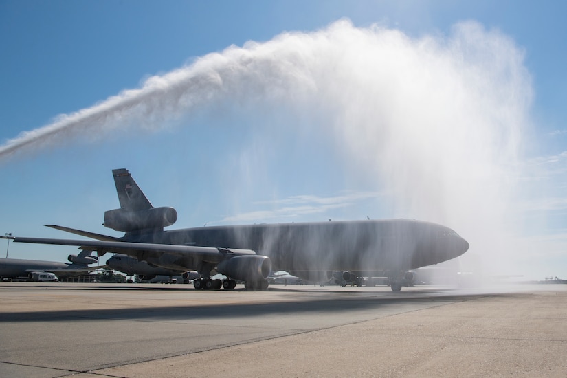 KC-10 Extender tail #86-0036 receives a traditional water salute as the 514th Air Mobility Wing U.S. Air Force Lt. Col. Mike Pillion prepares to fly it to the 309th Aerospace Maintenance and Regeneration Group at Davis-Monthan Air Force Base, Ariz., following a July 13 ceremony at Joint Base McGuire-Dix-Lakehurst, N.J., that marked the first retirement of 59 Extenders intended for eventual replacement by the KC-46A Pegasus. A total of three KC-10s from the Air Force’s Backup-Aircraft Inventory were congressionally approved for retirement during Fiscal Year 2020. As KC-10s are retired, the 309th AMARG will continue to support the remaining Extenders with spare parts as they are flown for several years while the KC-46A Pegasus is integrated into Air Mobility Command’s Total Force tanker enterprise. For nearly four decades, the KC-10 has helped secure global reach for America, providing in-flight refueling to U.S. and coalition aircraft, from Operations Desert Shield and Desert Storm to Operation Inherent Resolve. The KC-10 is flown from JBMDL by both the 305th AMW and its associate Air Force Reserve unit, the 514th AMW.