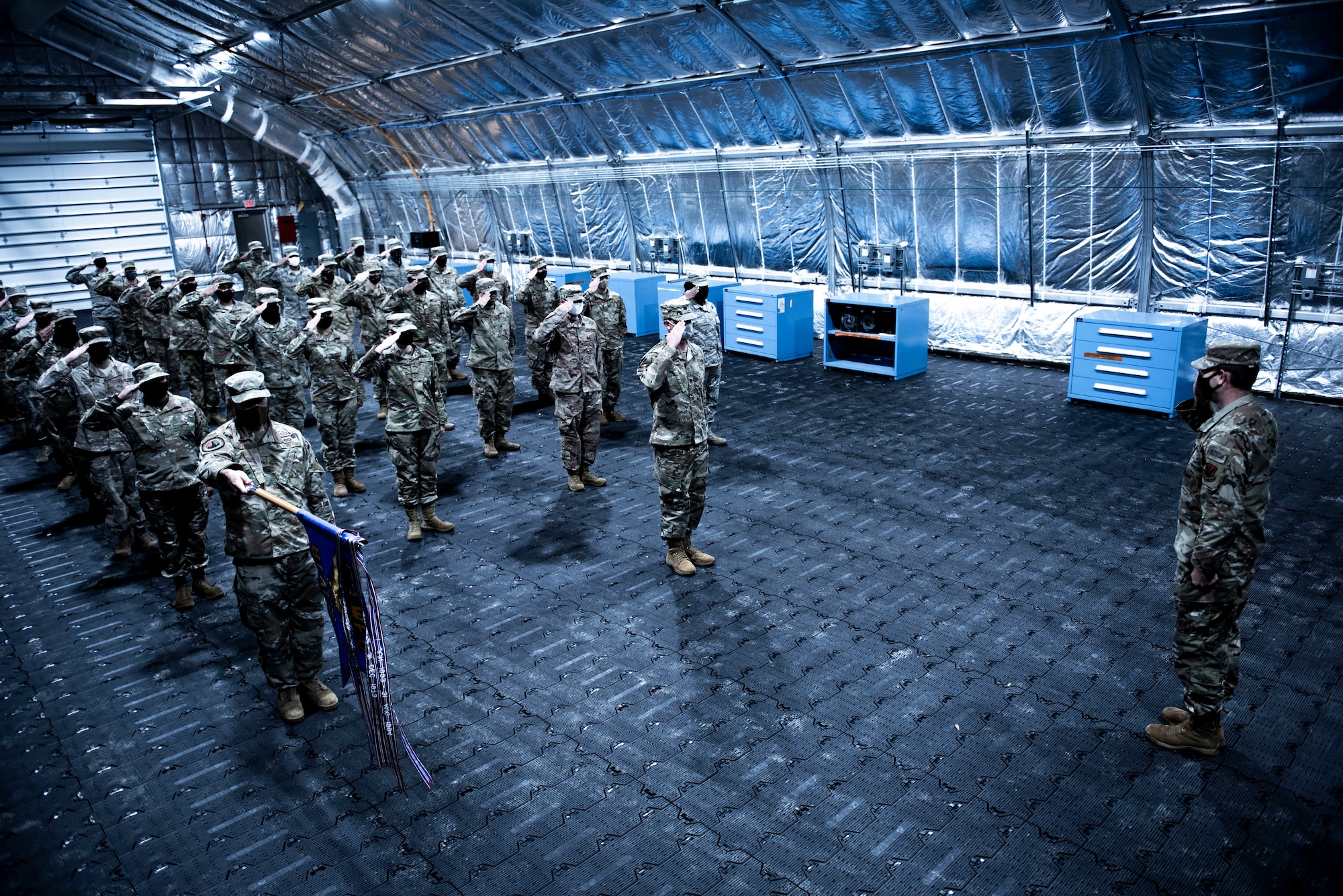 U.S. Airmen with the 81st Air Control Squadron render a first salute to U.S. Air Force Lt. Col. Steven Wyatt, 81st ACS commander, at Tyndall Air Force Base, Florida, July 8, 2020. Wyatt's change of ceremony was altered to comply with Coronavirus Disease 2019 (COVID-19) guidance. (U.S. Air Force photo by Staff Sgt. Magen M. Reeves)