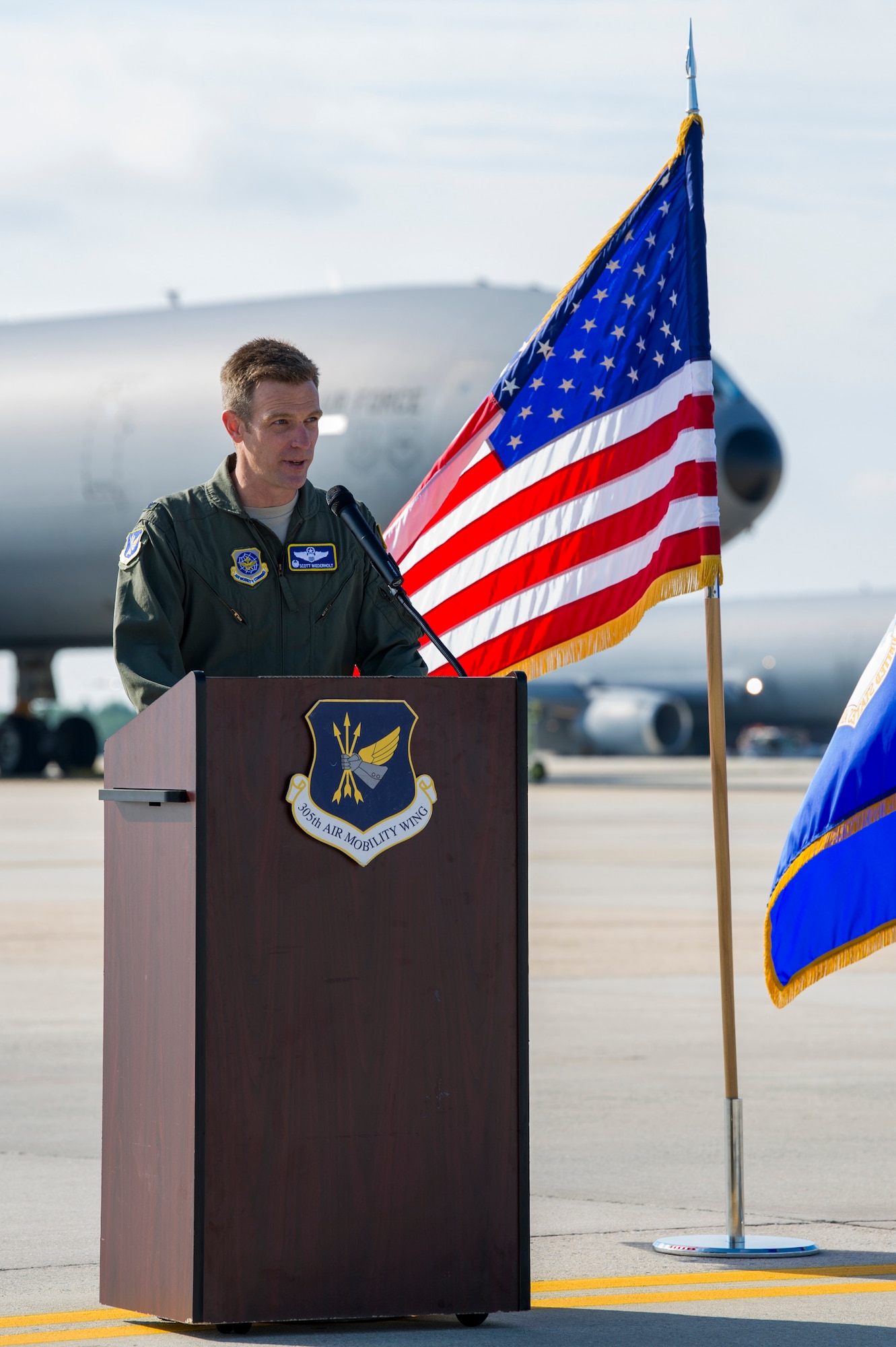 U.S. Air Force Col. Scott Wiederholt, 305th Air Mobility Wing commander, speaks to guests at a July 13 ceremony at Joint Base McGuire-Dix-Lakehurst, N.J., which marked the first retirement of 59 Extenders scheduled for eventual replacement by the KC-46A Pegasus. As the first of three KC-10s from the Air Force’s Backup-Aircraft Inventory congressionally approved for retirement during Fiscal Year 2020, Extender #86-0036, was flown to the 309th Aerospace Maintenance and Regeneration Group at Davis-Monthan Air Force Base, Ariz., where it will continue to support the remaining Extenders with parts as they are flown for several years while the KC-46A Pegasus is integrated into Air Mobility Command’s Total Force tanker enterprise. For nearly four decades, KC-10s have helped secure global reach for America, providing in-flight refueling to U.S. and coalition aircraft, from Operations Desert Shield and Desert Storm to Operation Inherent Resolve. The KC-10 is flown from JBMDL by both the 305th AMW and its associate Air Force Reserve unit, the 514th AMW.