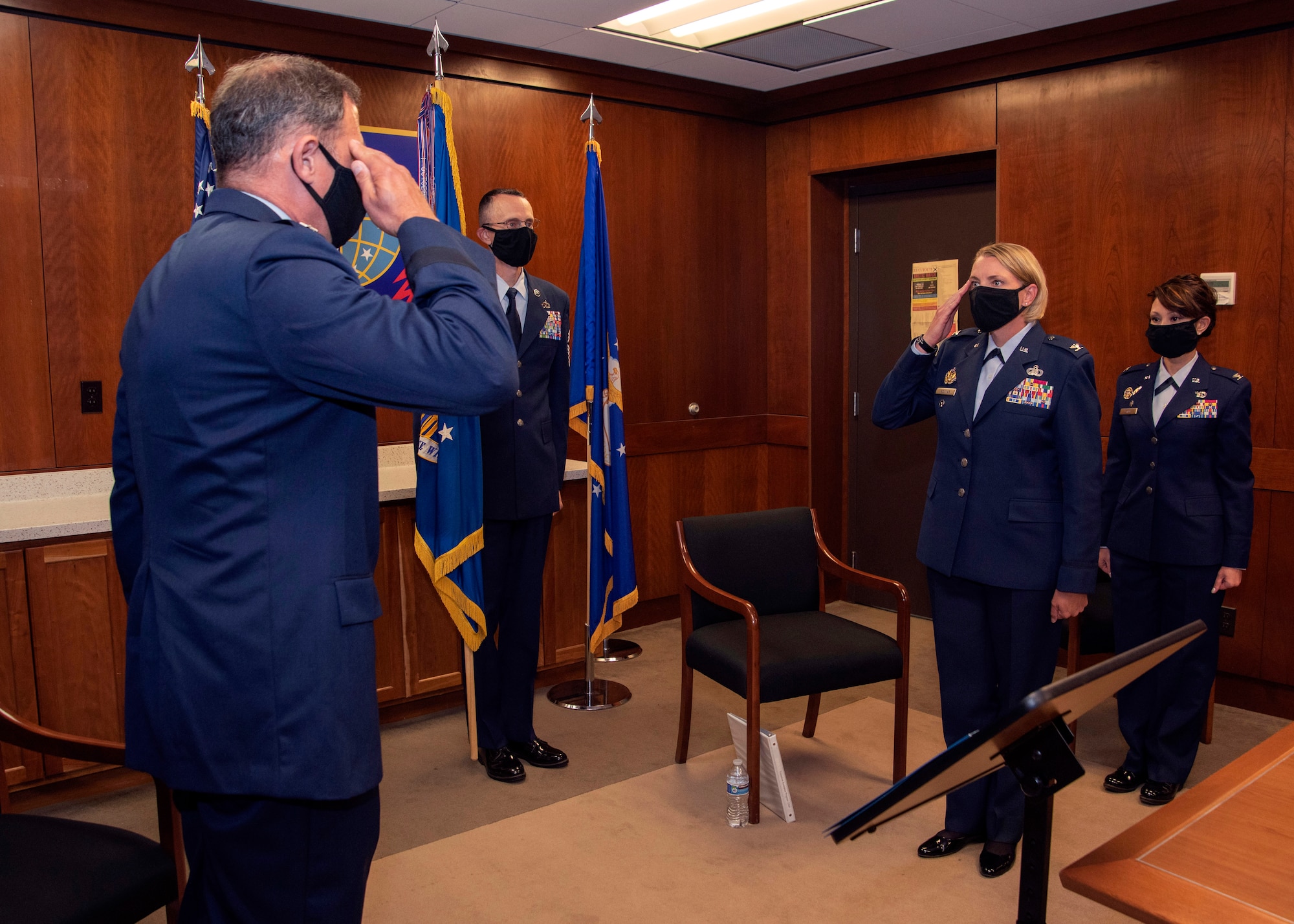 U.S. Air Force Col. Kirsten Aguilar assumes command of the 673d Air Base Wing during the change of command ceremony at Joint Base Elmendorf-Richardson, Alaska, July 14, 2020. The 673d ABW is composed of a command section, the 673d Comptroller Squadron, and four groups; the 673d Mission Support Group, the 673d Medical Group, 673d Civil Engineer Group, and the 673d Logistics Readiness Group. These are the primary organizations responsible for providing installation management functions to ensure JBER remains America's premier strategic power projection platform. The wing supports and enables three AF total-force wings, one Army brigade and 55 tenant units. The change of command ceremony was adapted to comply with COVID-19 health and safety measures.