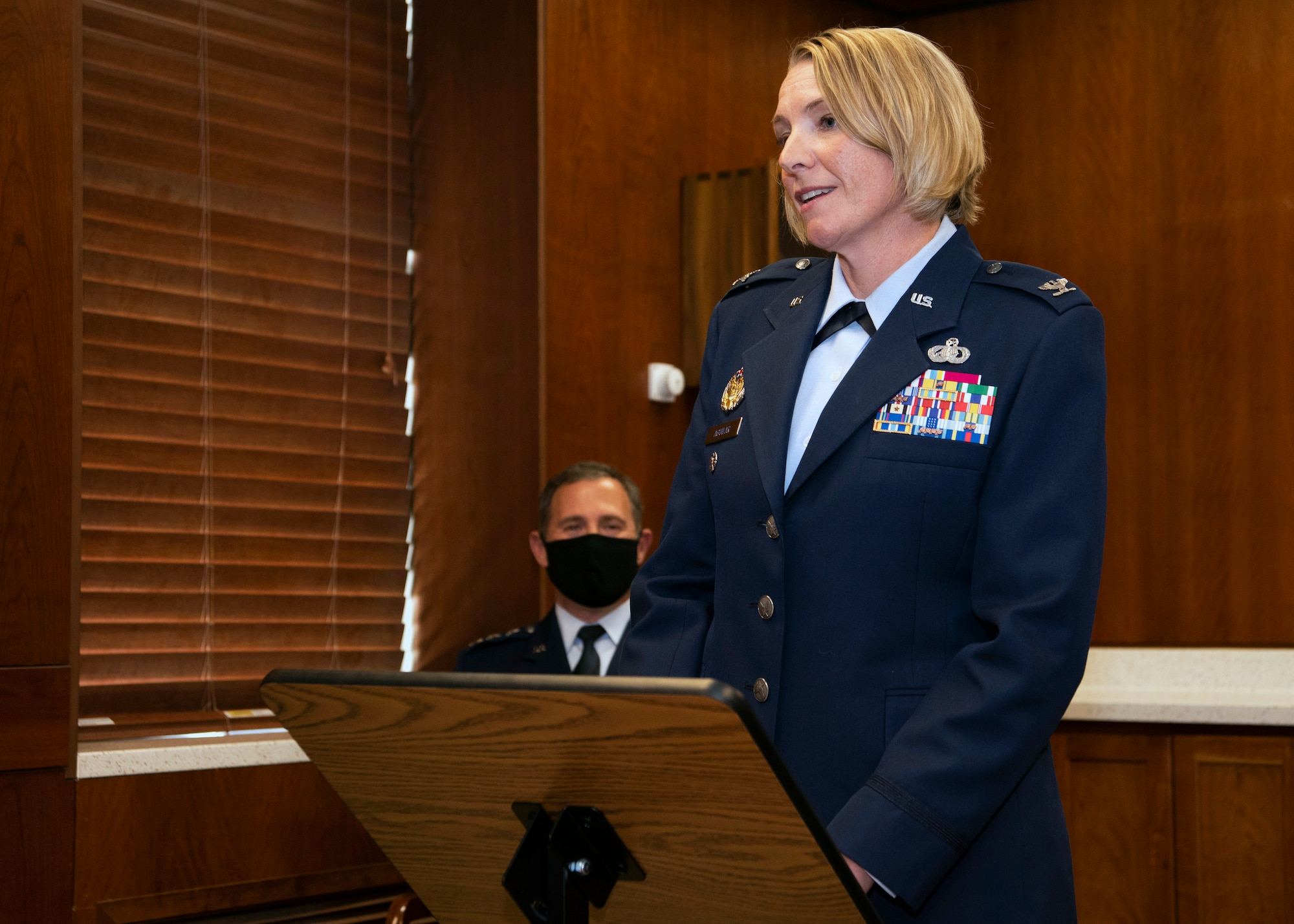 U.S. Air Force Col. Kirsten Aguilar speaks after assuming command during the 673d Air Base Wing change of command ceremony at Joint Base Elmendorf-Richardson, Alaska, July 14, 2020. The 673d ABW is composed of a command section, the 673d Comptroller Squadron, and four groups; the 673d Mission Support Group, the 673d Medical Group, 673d Civil Engineer Group, and the 673d Logistics Readiness Group. These are the primary organizations responsible for providing installation management functions to ensure JBER remains America's premier strategic power projection platform. The wing supports and enables three AF total-force wings, one Army brigade and 55 tenant units. The change of command ceremony was adapted to comply with COVID-19 health and safety measures.