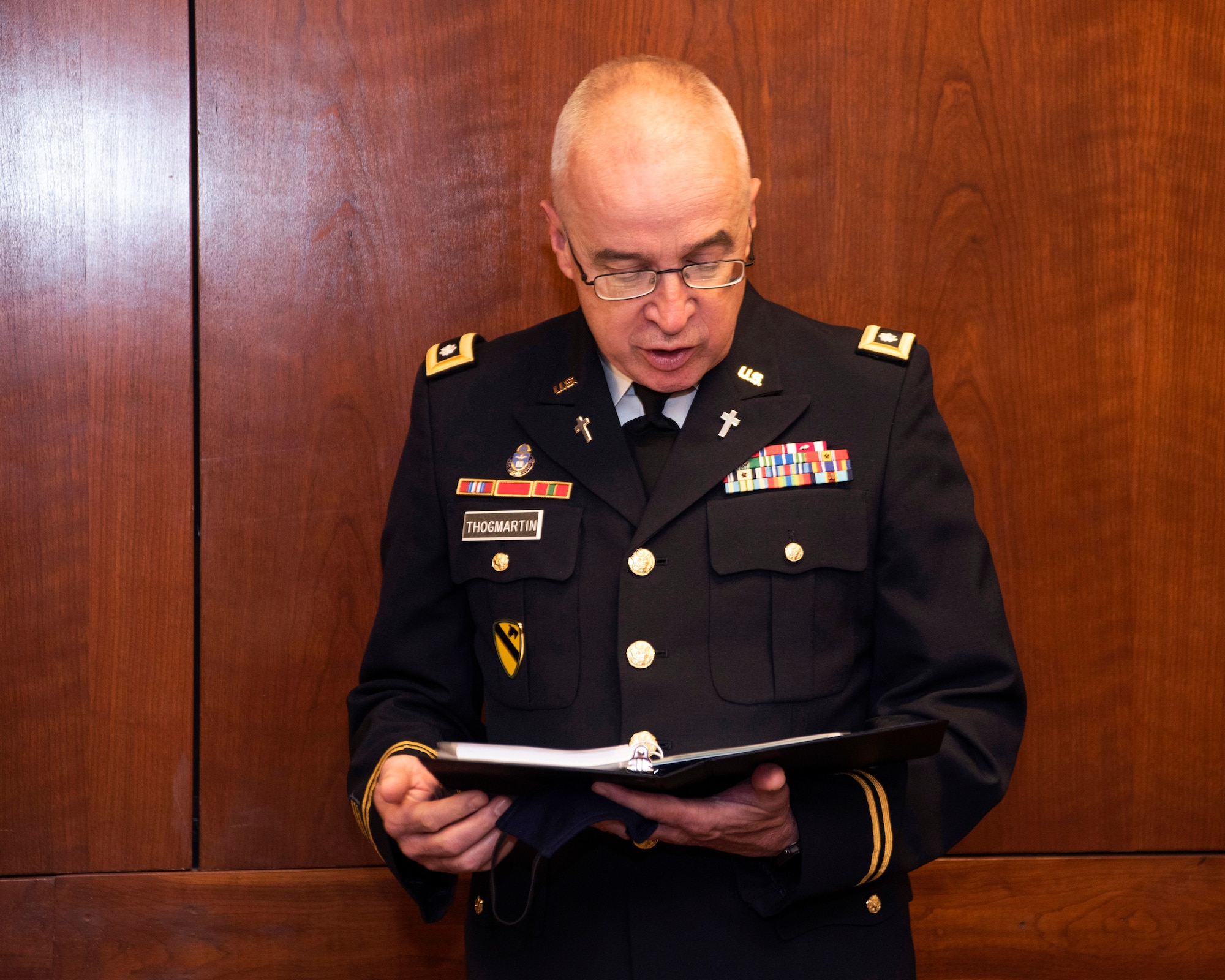U.S. Army Lt. Col. Gregory Thogmartin, a chaplain assigned to the 673d Air Base Wing, gives the invocation during the 673d Air Base Wing change of command ceremony at Joint Base Elmendorf-Richardson, Alaska, July 14, 2020. The 673d ABW is composed of a command section, the 673d Comptroller Squadron, and four groups; the 673d Mission Support Group, the 673d Medical Group, 673d Civil Engineer Group, and the 673d Logistics Readiness Group. These are the primary organizations responsible for providing installation management functions to ensure JBER remains America's premier strategic power projection platform. The wing supports and enables three AF total-force wings, one Army brigade and 55 tenant units. The change of command ceremony was adapted to comply with COVID-19 health and safety measures.