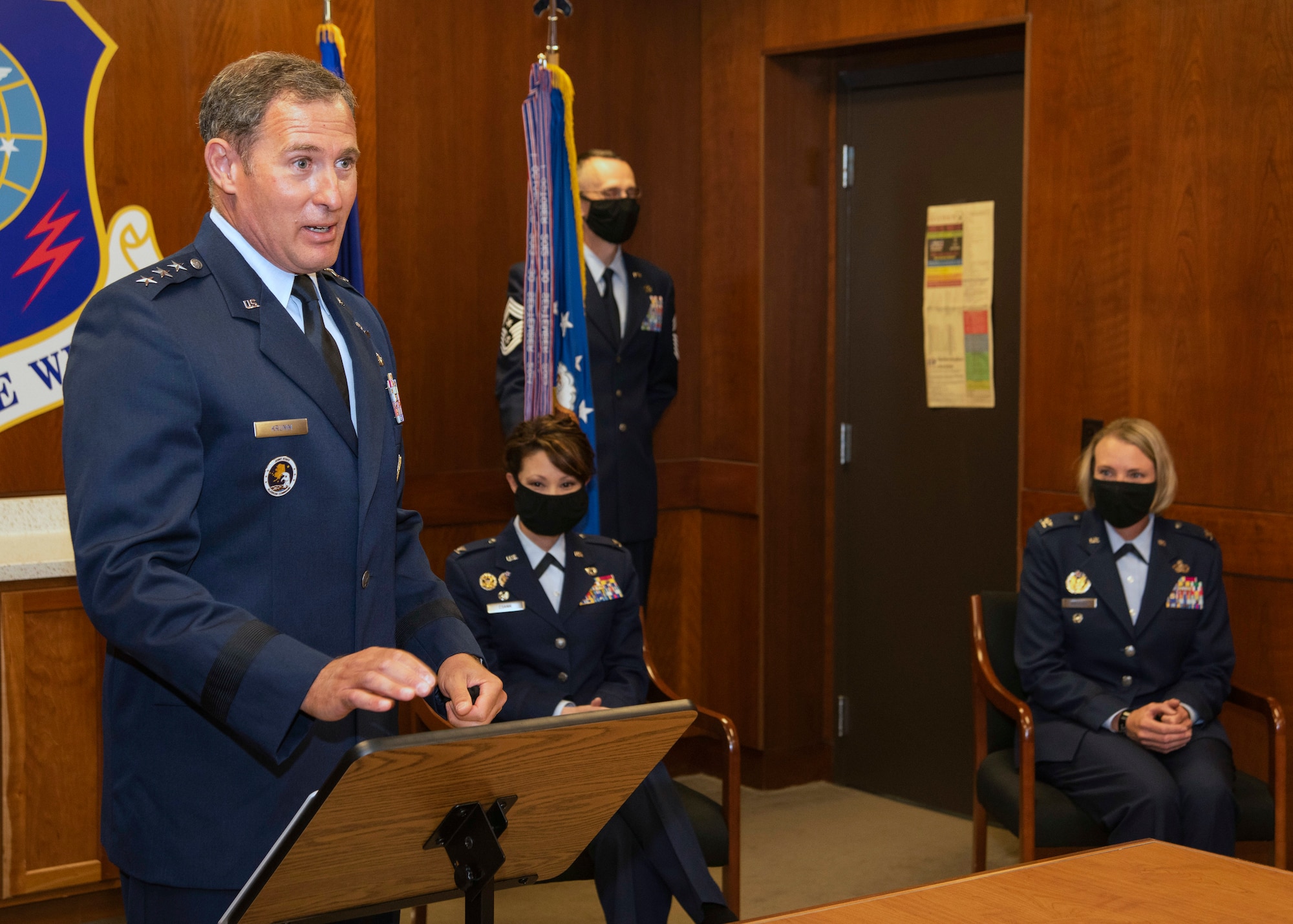 U.S. Air Force Lt. Gen. David Krumm, commander, Alaskan Command, Eleventh Air Force, North American Aerospace Defense Command Region, North American Aerospace Defense Command, speaks during the 673d Air Base Wing change of command ceremony at Joint Base Elmendorf-Richardson, Alaska, July 14, 2020. The 673d ABW is composed of a command section, the 673d Comptroller Squadron, and four groups; the 673d Mission Support Group, the 673d Medical Group, 673d Civil Engineer Group, and the 673d Logistics Readiness Group. These are the primary organizations responsible for providing installation management functions to ensure JBER remains America's premier strategic power projection platform. The wing supports and enables three AF total-force wings, one Army brigade and 55 tenant units. The change of command ceremony was adapted to comply with COVID-19 health and safety measures.