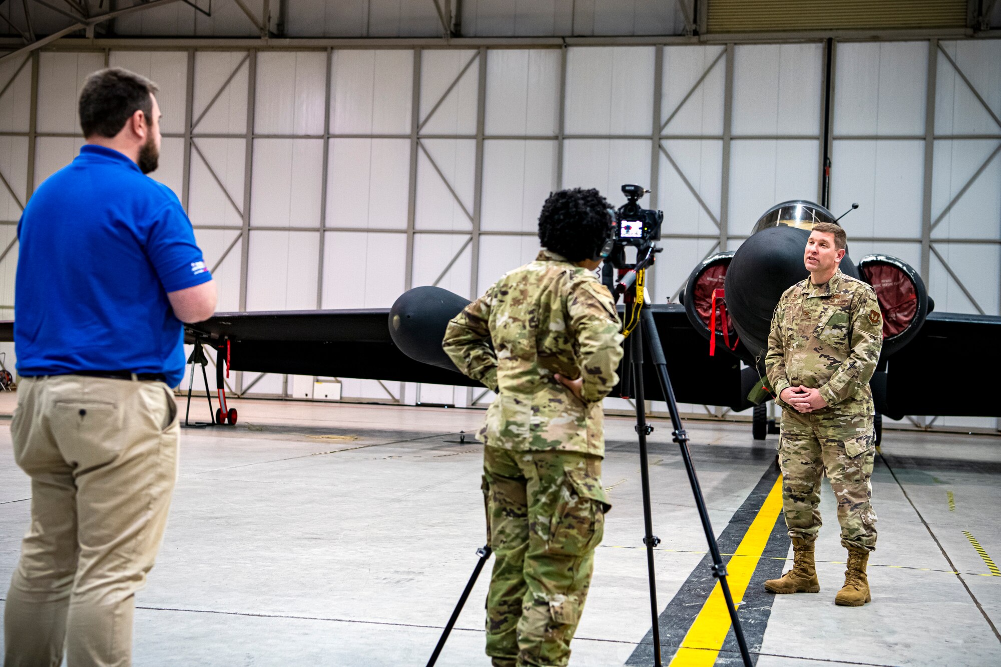 U.S. Air Force Col. Kurt A. Wendt, right, 501st Combat Support Wing commander, performs a video interview in a hangar at RAF Fairford, England, July 7, 2020. Wendt conducted the interview as part of the 2020 Virtual Royal International Air Tattoo. (U.S. Air Force photo by Senior Airman Eugene Oliver)