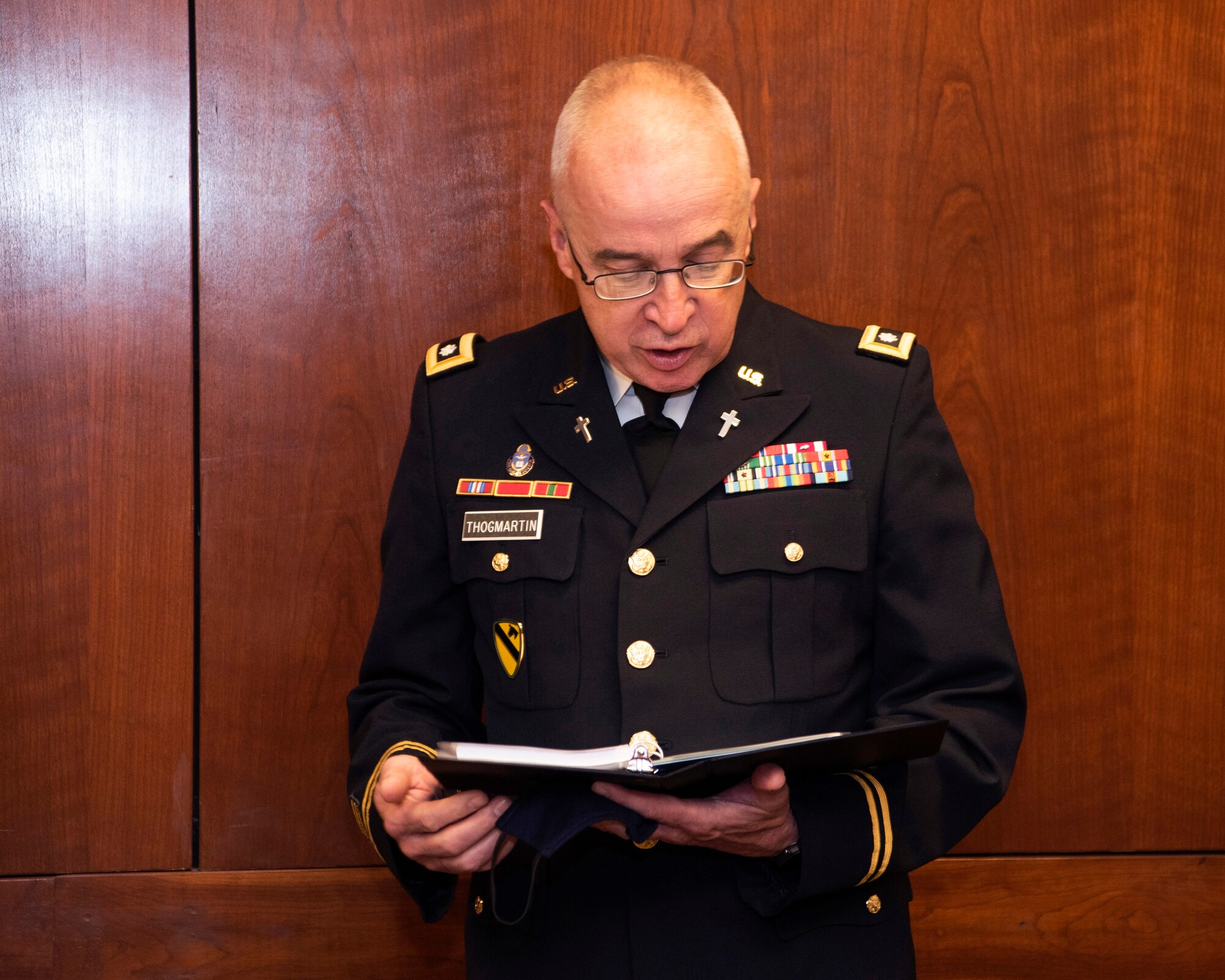 U.S. Army Lt. Col. Gregory Thogmartin, a chaplain assigned to the 673d Air Base Wing, gives the invocation during the 673d Air Base Wing change of command ceremony at Joint Base Elmendorf-Richardson, Alaska, July 14, 2020. The 673d ABW is composed of a command section, the 673d Comptroller Squadron, and four groups; the 673d Mission Support Group, the 673d Medical Group, 673d Civil Engineer Group, and the 673d Logistics Readiness Group. These are the primary organizations responsible for providing installation management functions to ensure JBER remains America's premier strategic power projection platform. The wing supports and enables three AF total-force wings, one Army brigade and 55 tenant units. The change of command ceremony was adapted to comply with COVID-19 health and safety measures.
